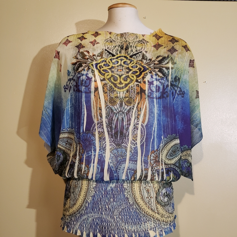 Colourful top with interesting pattern.